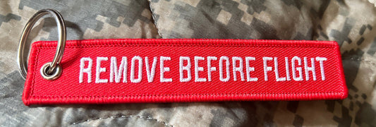 REMOVE BEFORE FLIGHT KEY CHAIN/BAG TAG - (NEW)